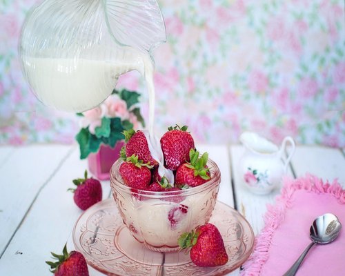 Home table setup with fresh fruit and a glass of water